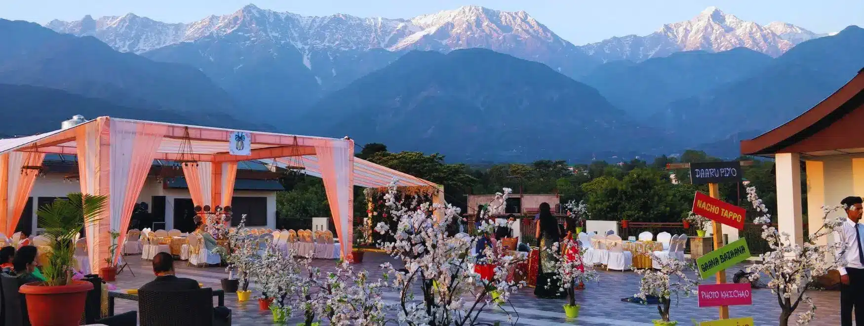 Romantic couple embraces amidst the breathtaking landscapes of Dharamshala, the perfect backdrop for their dream destination weddings in Dharamshala.