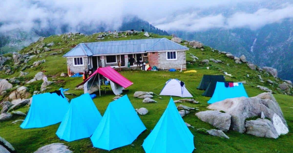 Triund vs. Kareri Lake Trek – Two breathtaking Himalayan trails, each offering a unique adventure: one a popular ridge with panoramic valley views, the other a serene alpine lake nestled in solitude. Which one will you choose?