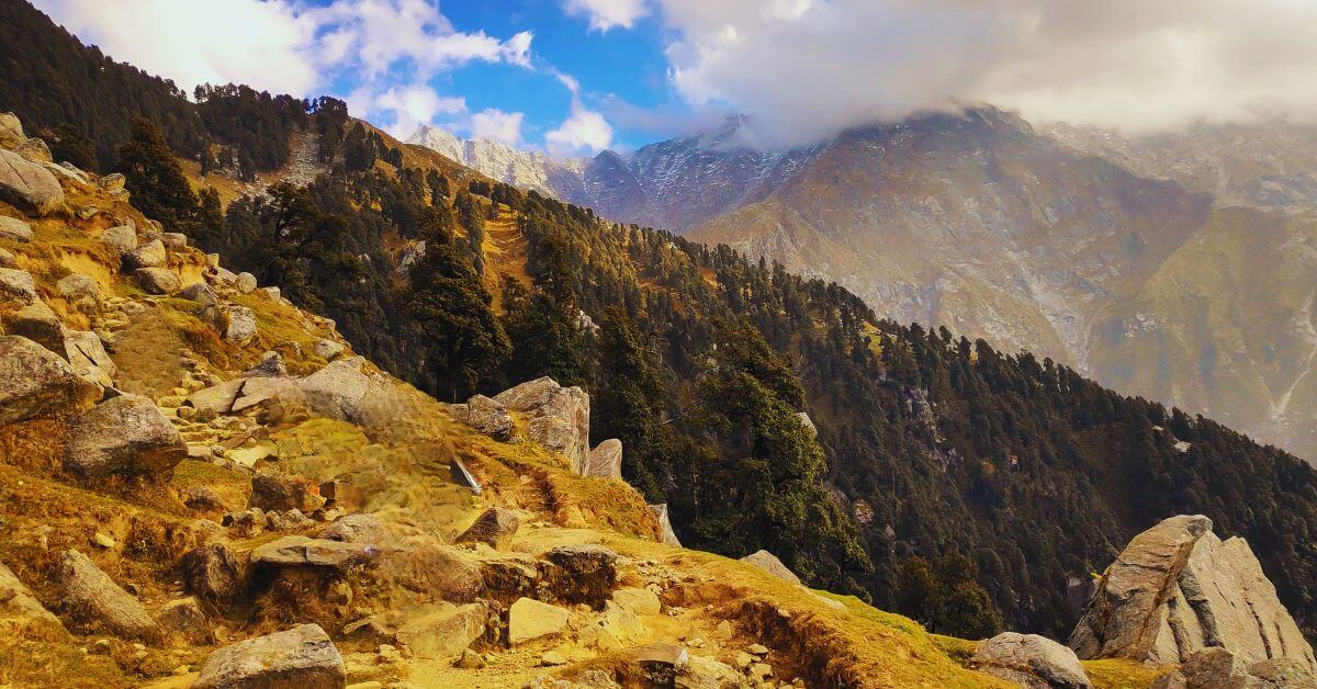 Triund vs. Kareri Lake Trek – Two breathtaking Himalayan trails, each offering a unique adventure: one a popular ridge with panoramic valley views, the other a serene alpine lake nestled in solitude. Which one will you choose?